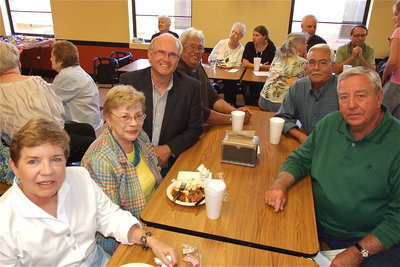 Image: Class of 1962 reunion: (Left side of table, front to back) Janetta Morris, Jane Gorman Acker, Darrell Cockerham and Pablo Jacinto. (Right side of table, front to back) Jimmy Hyles and Lucio Jacinto.