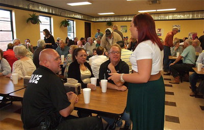 Image: Recipient Molly Haight chats with Chief Diron Hill, Dora Bassett and Italy ISD Superintendent Barry Bassett.