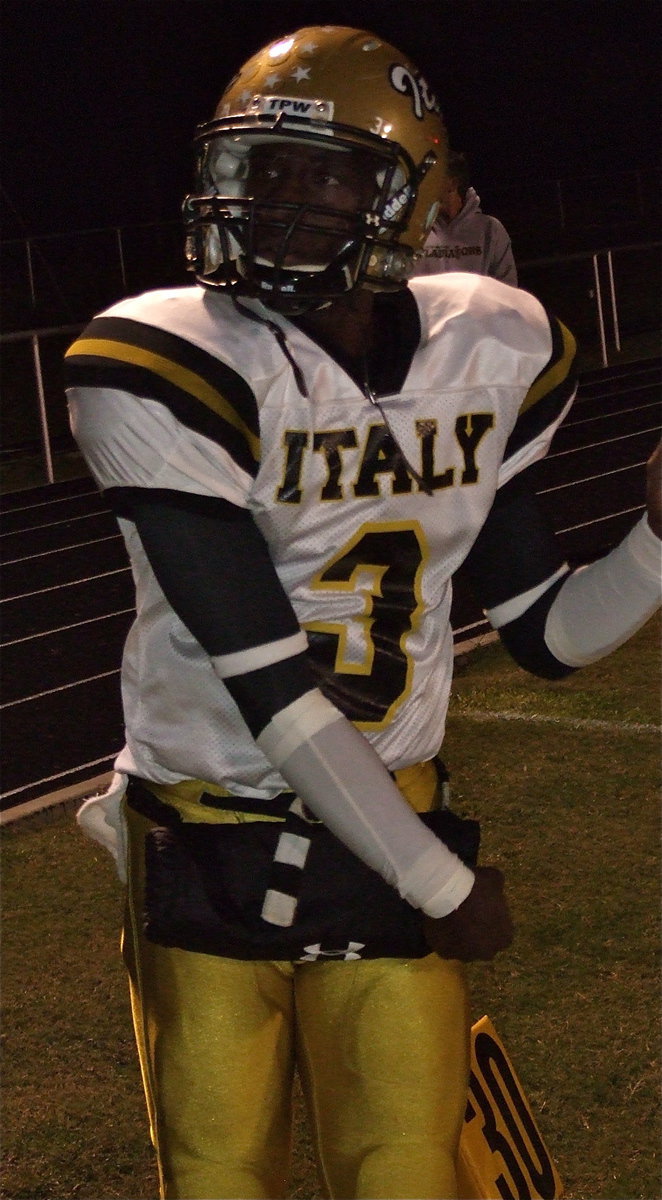 Image: Gladiator quarterback Marvin Cox(3) warms up the throwing arm before the kickoff. Cox completed 5-of-12 passes for 69 yards and 1 touchdown of 33 yards to fellow senior Kelvin Joffre. Cox also carried 21 times for 138 yards including the game winning touchdown late in the fourth-quarter.