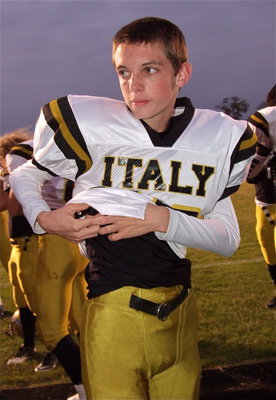 Image: Italy freshman Ty Windham gets suited up to take on Cayuga.