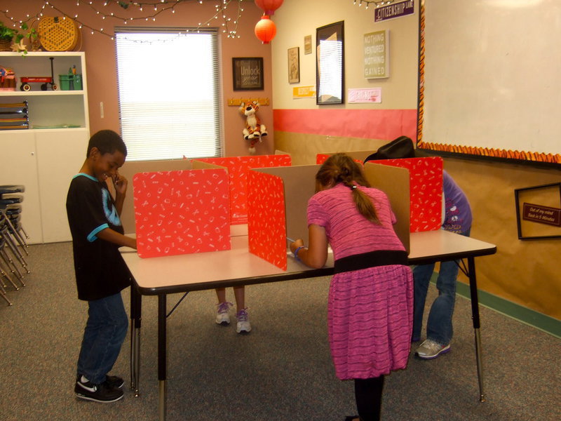 Image: Students voting.