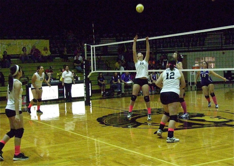 Image: Madison Washington(10) bumps the the ball to her teammates.