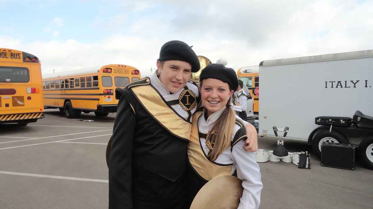 Image: Brett Kirton and Maddie Pittman prepare for the drumline.