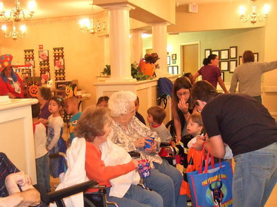 Image: Residents are having fun visiting with the students.