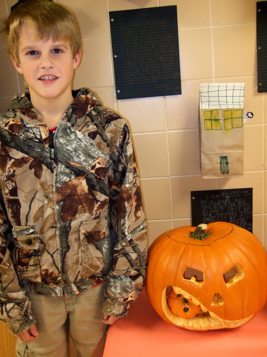 Image: Reese Janek with his winning jack-o’-lantern.