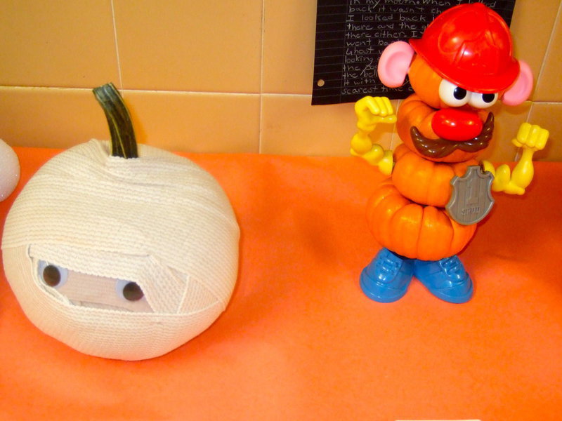 Image: Mummy and Mr. Potato Head jack-o’-lanterns.