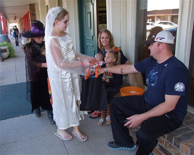 Image: Ronnie Hyles Home Supply of Italy participates in trick-or-treat on main street.