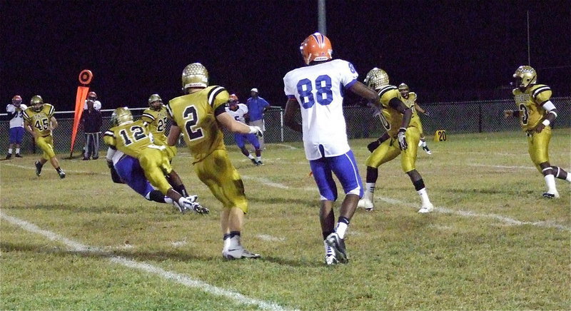 Image: Eric Carson(12) delivers a hit on a Gateway receiver during Italy’s 34-14 win over the Gators during Senior Night 2012 for the Gladiators. Italy is now 4-0 in district play and a win over Kerens will give the Gladiators sole claim to the 2012 district championship. A Kerens win could create a 3-way tie between Italy, Cayuga and Kerens.