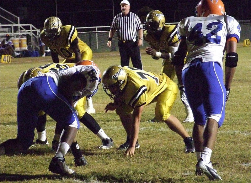 Image: Left tackle Cody Medrano(75) and left guard Darol Mayberry(58) help get Ryheem Walker(10) and quarterback Marvin Cox(3) in the end zone against Gateway.