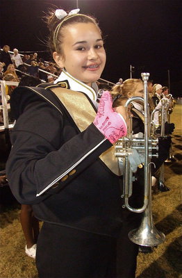 Image: Amber Hooker gives a thumbs up before the bands performance.