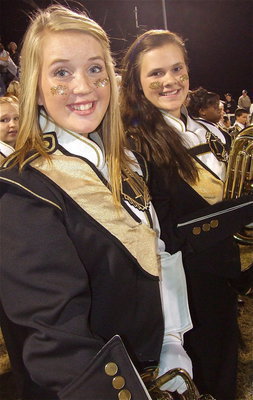 Image: Hannah Washington and Lillie Perry are excited for their Gladiator Regiment Marching Band and Color Guard on Senior Night.