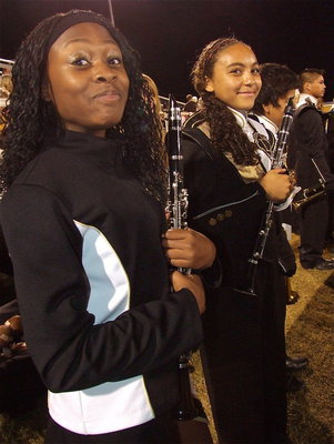Image: K’Breona Davis and Vanessa Cantu stand proud with their fellow band members.