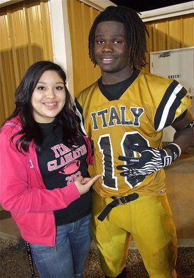 Image: Lady Gladiator Monserrat Figueroa and her favorite Gladiator Ryheem Walker point out that Italy needs just one more win to claim the district championship.