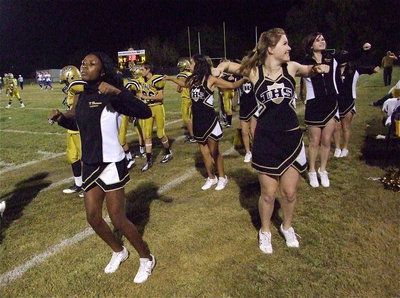 Image: Cheerleaders K’Breona Davis, Ashlyn Jacinto, Taylor Turner and senior Meagan Hooker bust a groove for the Gladiators!