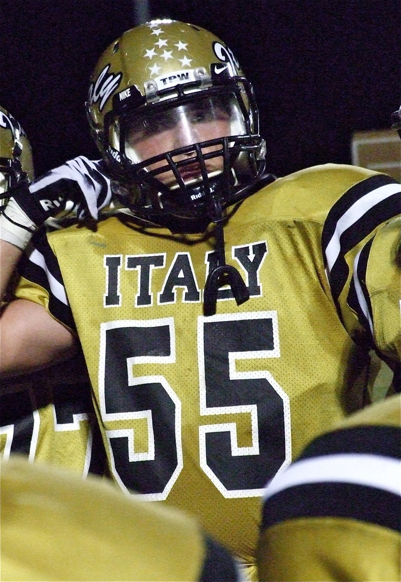 Image: Senior Gladiator Zackery Boykin(55) buckles up to take on Gateway.