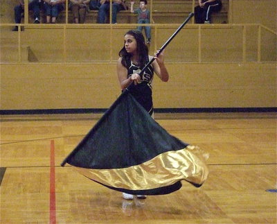 Image: Color guard member Ashlyn Jacinto performs during the pep rally.