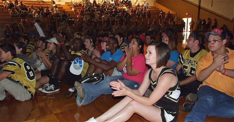 Image: The Seniors gather on the gym floor during the pep rally to watch a film about the seniors created by senior Meagan Hooker. Seniors rule!