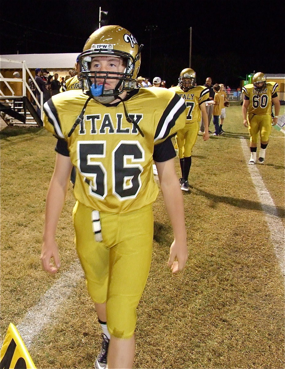 Image: John Escamilla(56), Brandon Connor(77) and Kevin Roldan(60) help skin the Gators 34-14 for district win number 4.