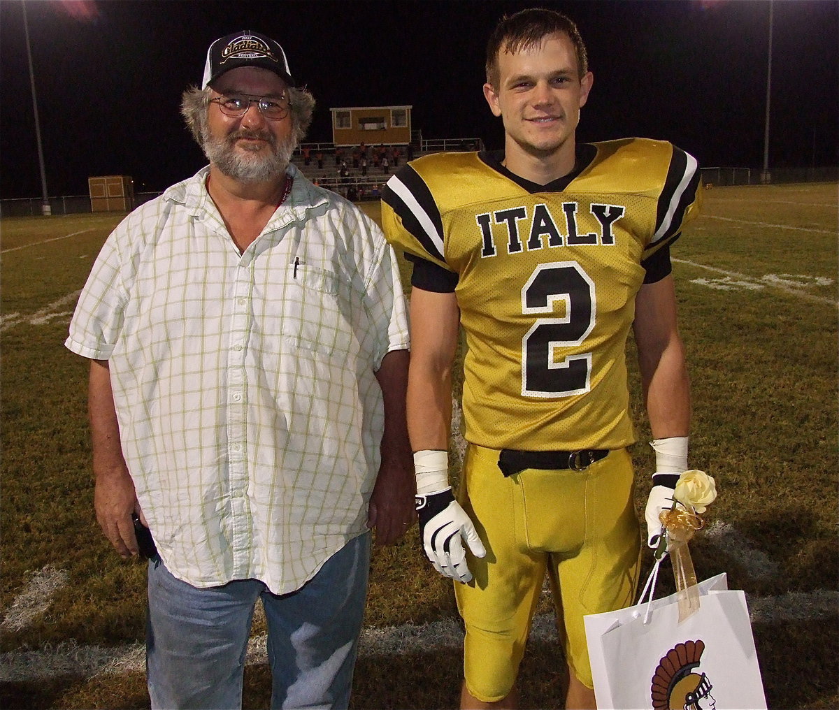 Image: Senior Gladiator Chase Hamilton(2), the son of DeeDee and Lee Hamilton, is escorted by his uncle Mark Hamilton. Chase will attend the Military Core and become a firefighter for the Air Force. Chase’s hobbies and interests include playing video games and hanging out with friends. His most memorable moment in athletics was when Marvin Cox fell in the mud every Thursday in 7th grade.