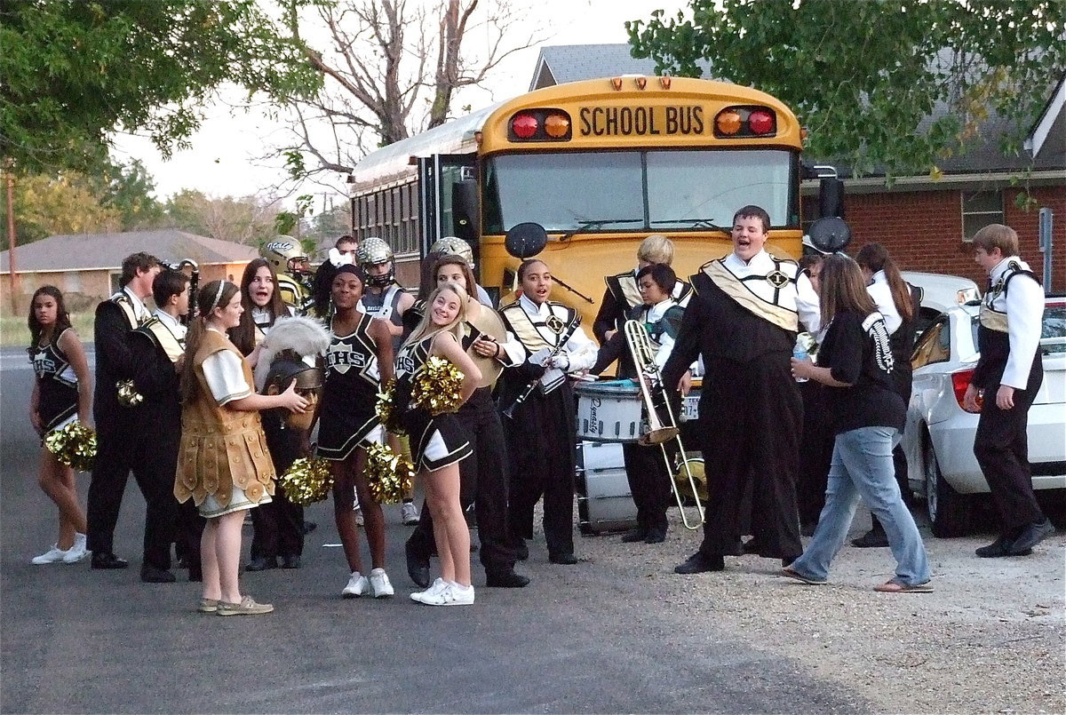 Image: The party has arrived! The Italy High School cheerleaders, Gladiator band and football players are ready to celebrate the mock birthday party for Shorty the pup, during the making of the short film.