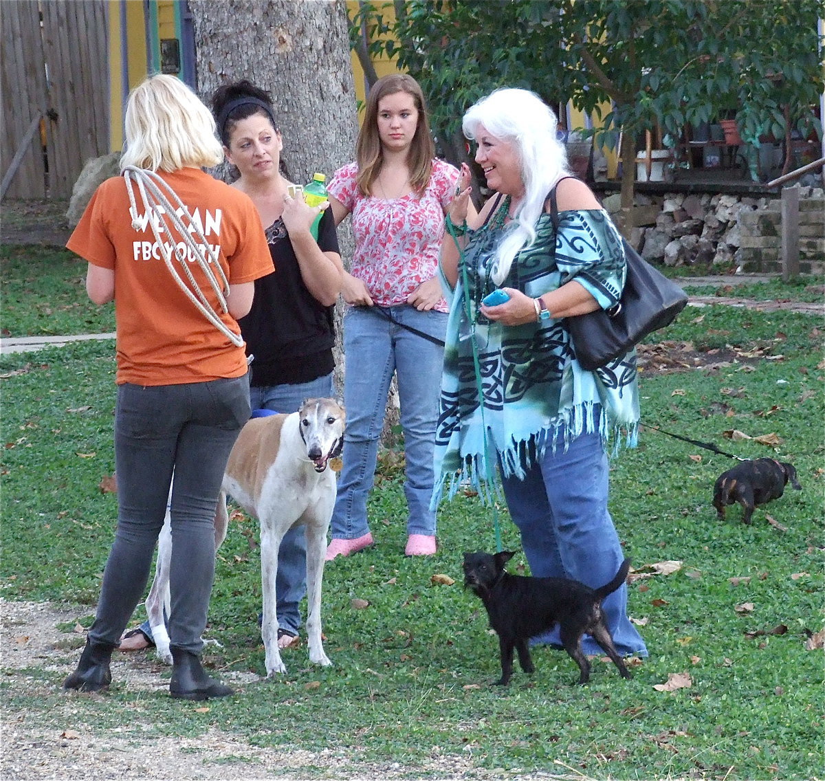 Image: Film makers keep their animal stars and owners on a schedule. On the right is Sugar Roberts with her star pet, Shorty.