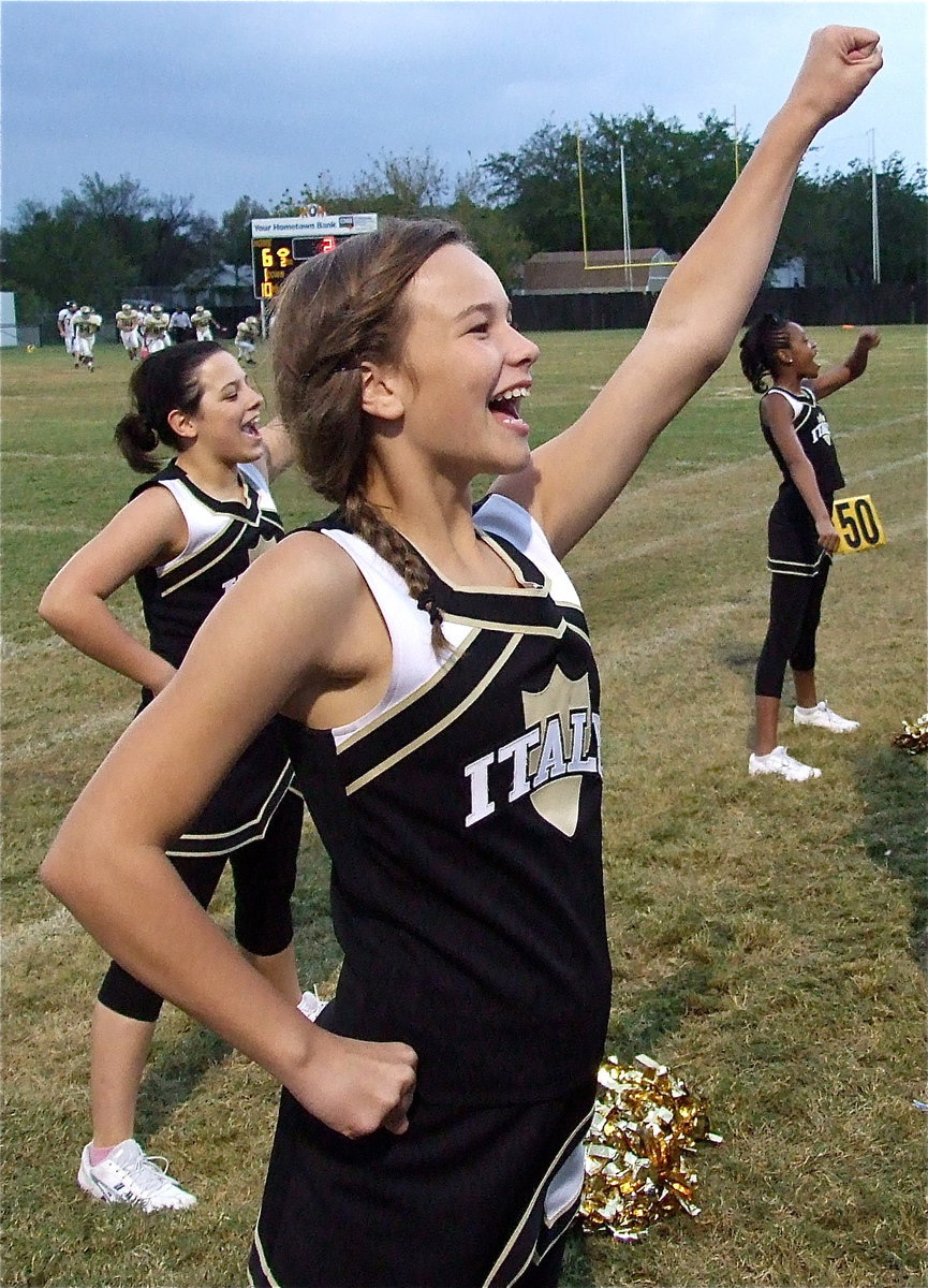 Image: Paige Little, Caroline Pittman and Sierra Wilson keep that spirit up along Italy’s sideline.