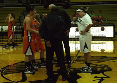 Image: Alyssa Richards meets Kemp at center court before the start of the game.