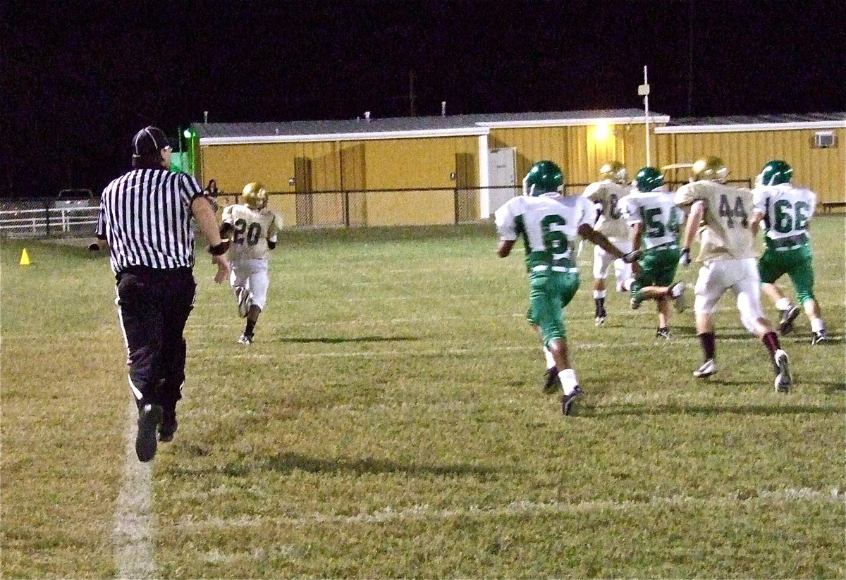 Image: He…could…go…all…the…wayyyy! Kendrick Norwood(20) finishes off the 45-yard touchdown run against Kerens.