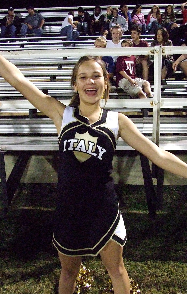 Image: Italy JH cheerleader Paige Little cheers on her team against Kerens!