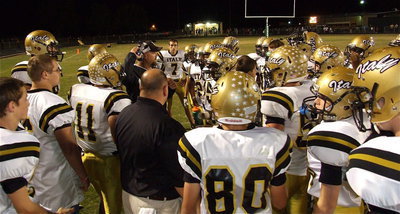 Image: Gladiator head coach Hank Hollywood addresses his team in the second half.