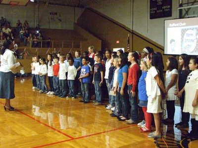 Image: The Stafford Elementary choir includes 3rd-5th graders and they sang “God Bless America” and “The Fifty States”.