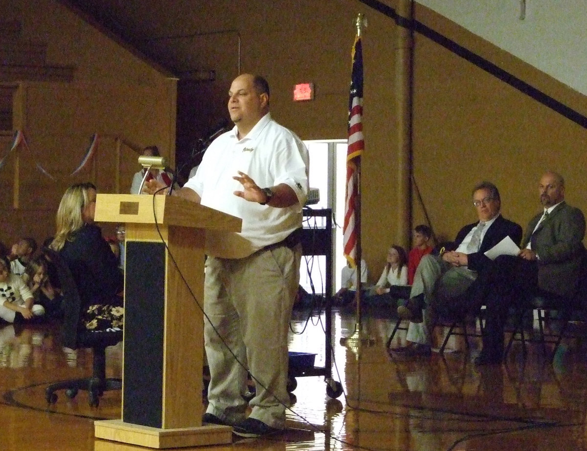 Image: Speaker, Brian Coffman, US Navy, gave an encouraging speech to the crowd.