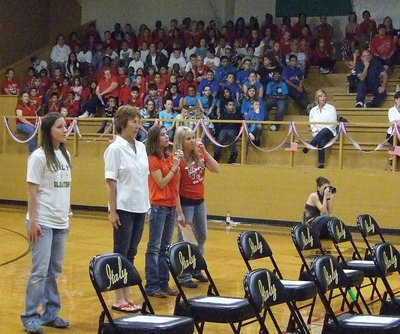 Image: Stafford Elementary teachers help the young students in the choir.
