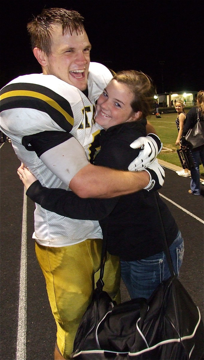 Image: Chase Hamilton(2) celebrates Italy’s district championship with team videographer Reagan Cockerham.