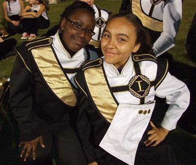 Image: Gladiator Regiment Marching Band members Brenya Williams and Vanessa Cantu strike a pose with Italy on the verge of claiming the district title.