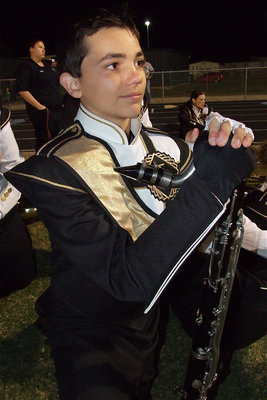Image: Gladiator Regiment Marching Band member Blake Brewer checks out the Kerens’ band during halftime.