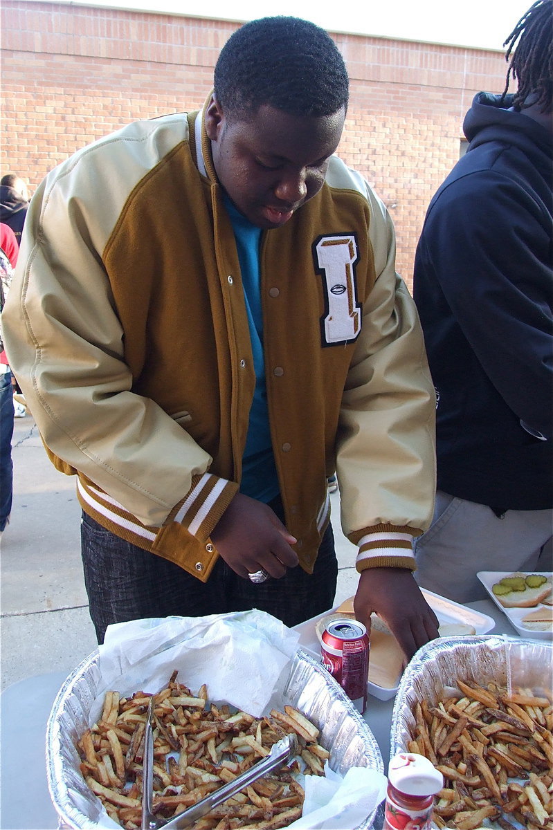 Image: Adrian Reed is a champ when it comes to football fields and hamburgers.