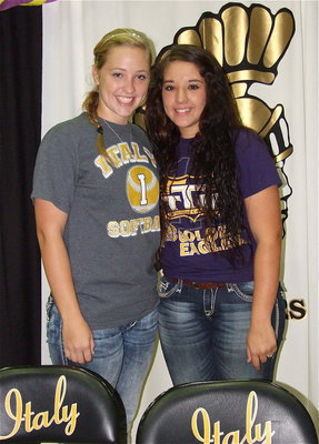 Image: Lady Gladiator pitcher Jaclynn Lewis congratulates catcher Alyssa Richards upon her signing. The talented twosome will teamup in later this spring for Italy High School.