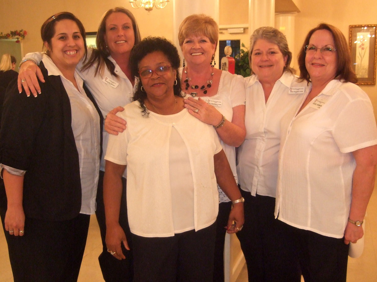 Image: Trinity Mission’s staff decked out in black and white ready to serve up the turkey.