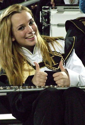 Image: Gladiator Regiment Band member Sarah Levy gives a thumbs up for the Gladiators.