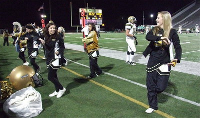 Image: Kelsey Nelson, Morgan Cockerham, Ashlyn Jacinto and their IHS cheer mates help provide excitement along the Gladiator sideline.