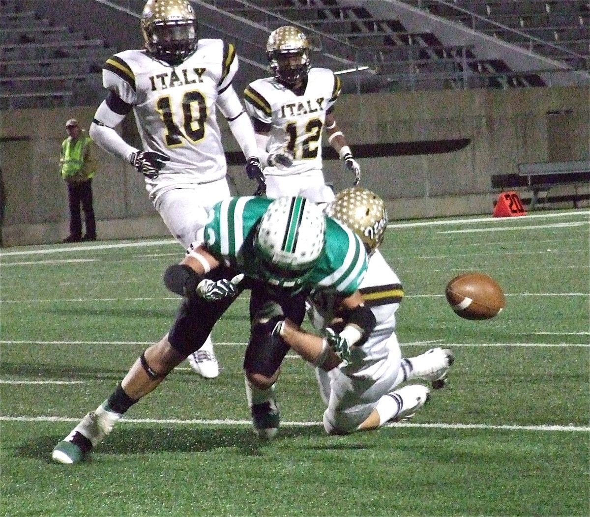 Image: Gladiator Chase Hamilton(2) breaks up a pass intended for Valley View’s Josh Bridges(22) as Ryheem Walker(10) and Eric Carson(12) hustle over to make sure.