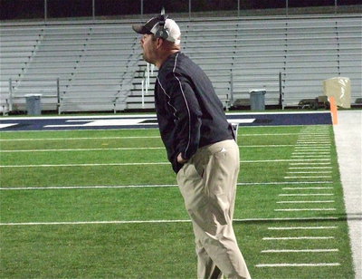 Image: Gladiator head coach Hank Hollywood stays active along the sideline late in the game.