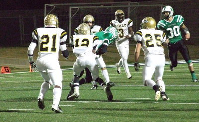 Image: Eric Carson(12) pulls down Eagle receiver Cole Seese(7) with Valley View desperately trying to reach the end zone as Italy’s Jalarnce Lewis(21), Shad Newman(25), Kyle Fortneberry(66) and Marvin Cox(3) converge on the ball. The Gladiators secure a 35-14 win to claim the area championship.
