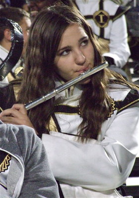 Image: Alexis Sampley tests her flute before the Gladiators hit the field to take on Valley View.