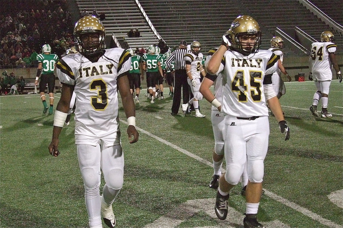 Image: Marvin Cox(3) and Hunter Merimon(45) head to the sideline with the first-quarter coming to a close.