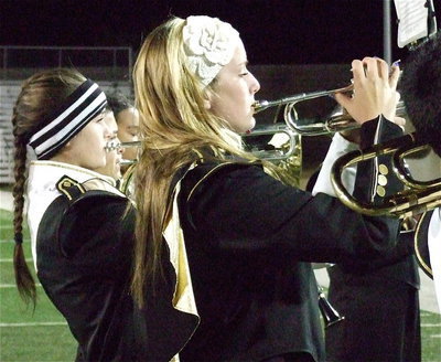 Image: Gladiator Regiment Band members Amber Hooker and Madison Washington make some noise during the game.