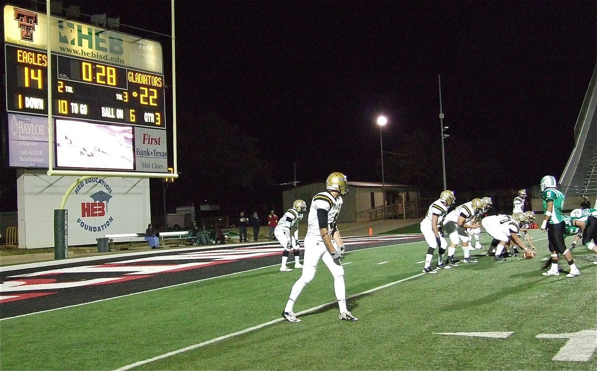 Image: Valley View has Cole Hopkins(9) and the Italy offense looking over their shoulder with the Eagles trailing by only 7-points and with the Gladiators backed up near their own end zone late in the third-quarter.