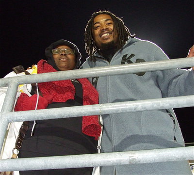 Image: IHS teacher Brenda Davis and her son, former NFL star, but always a Gladiator, Keith Davis, are on hand to cheer on the team.