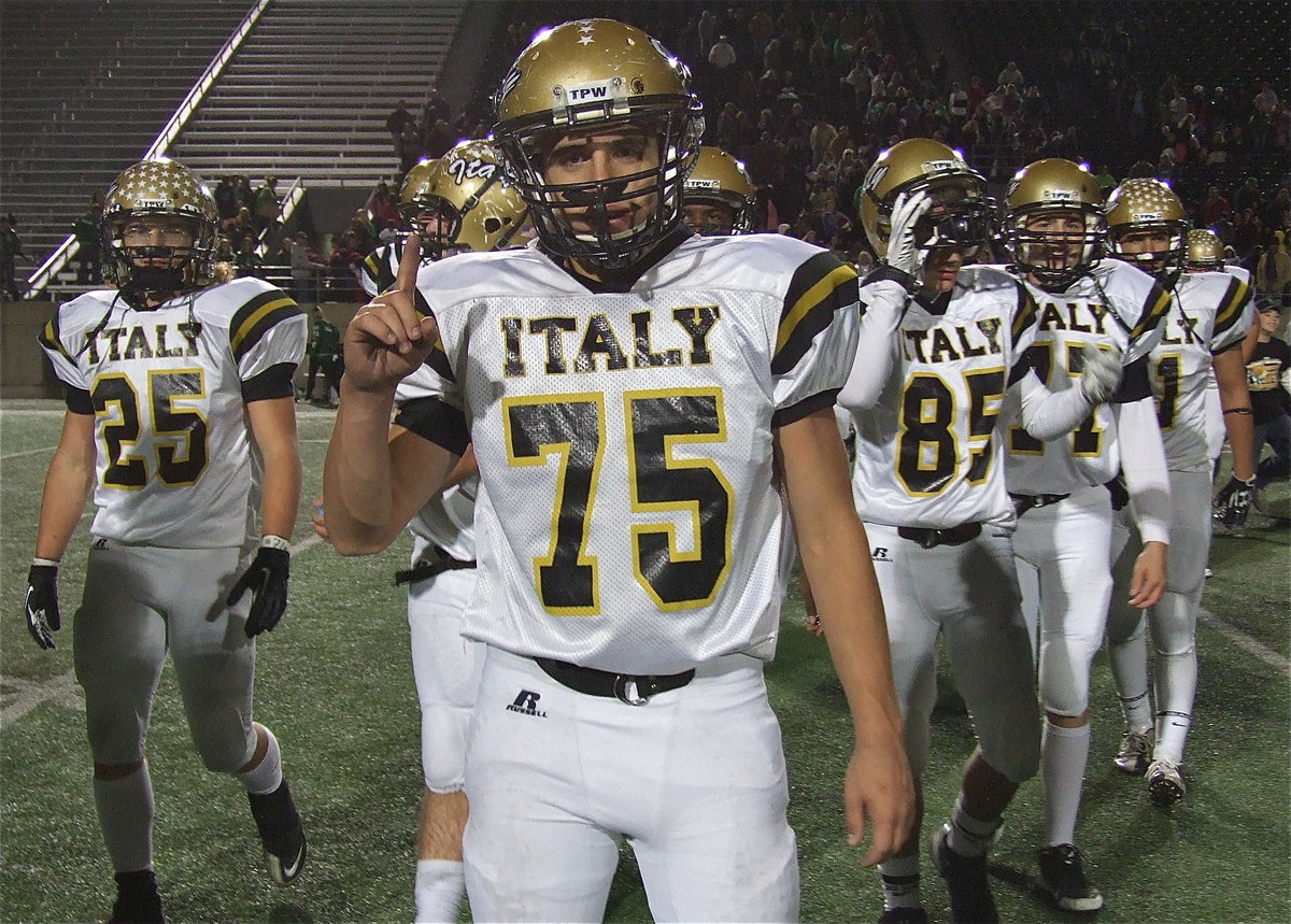 Image: Cody Medrano(75) is proud of his teammates after they claimed the area championship by defeating Valley View 35-14.